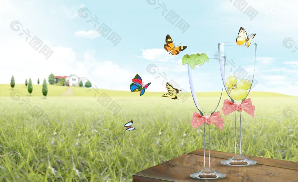 蝴蝶杯子草地风景图图片