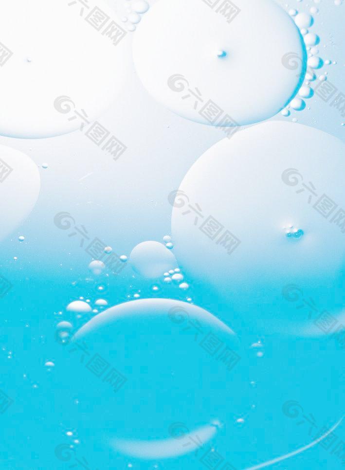 蓝色水面油滴背景图片
