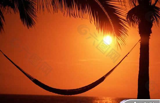 海景夕阳椰树PPT模板