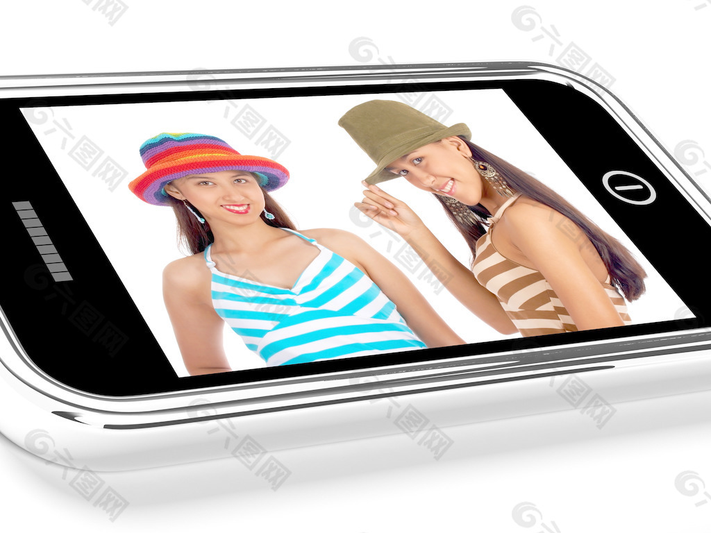 两位朋友在帽子图片上的智能手机