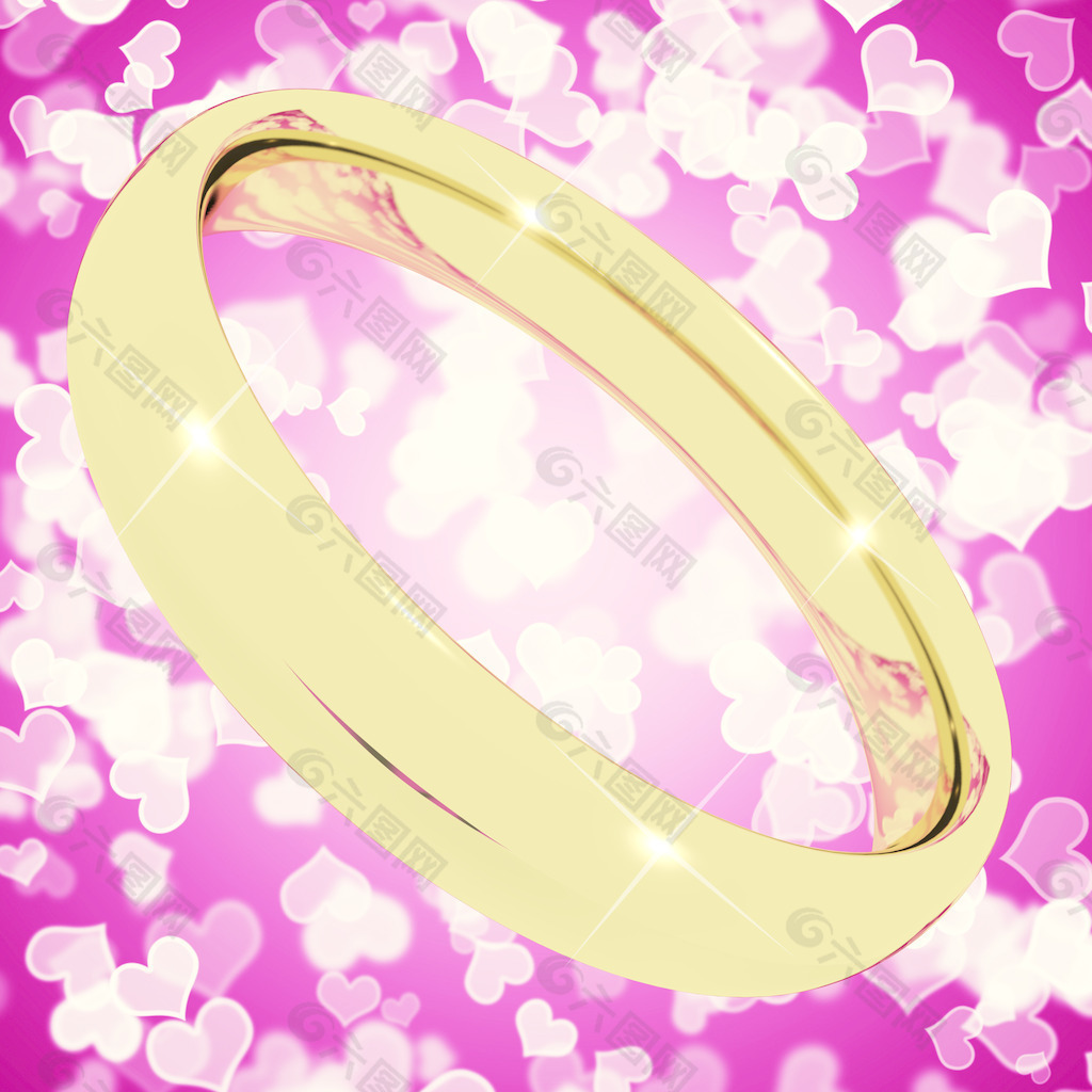粉红色背景虚化背景的心代表爱的情人 结婚金戒指