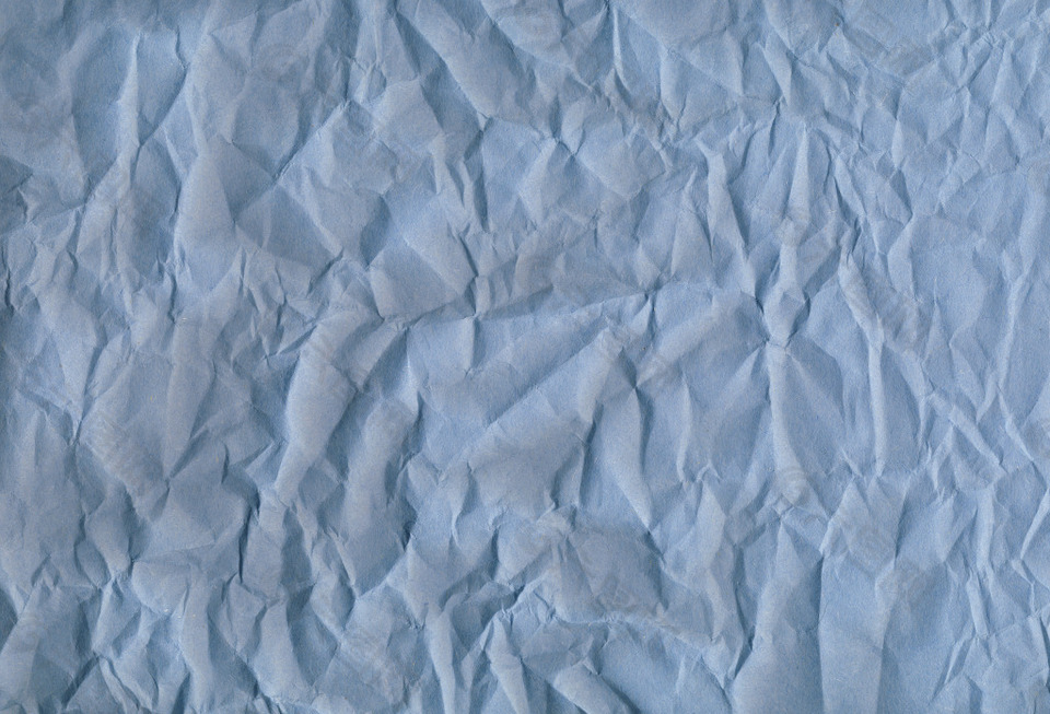 蓝色褶皱纸张底纹背景高清图片