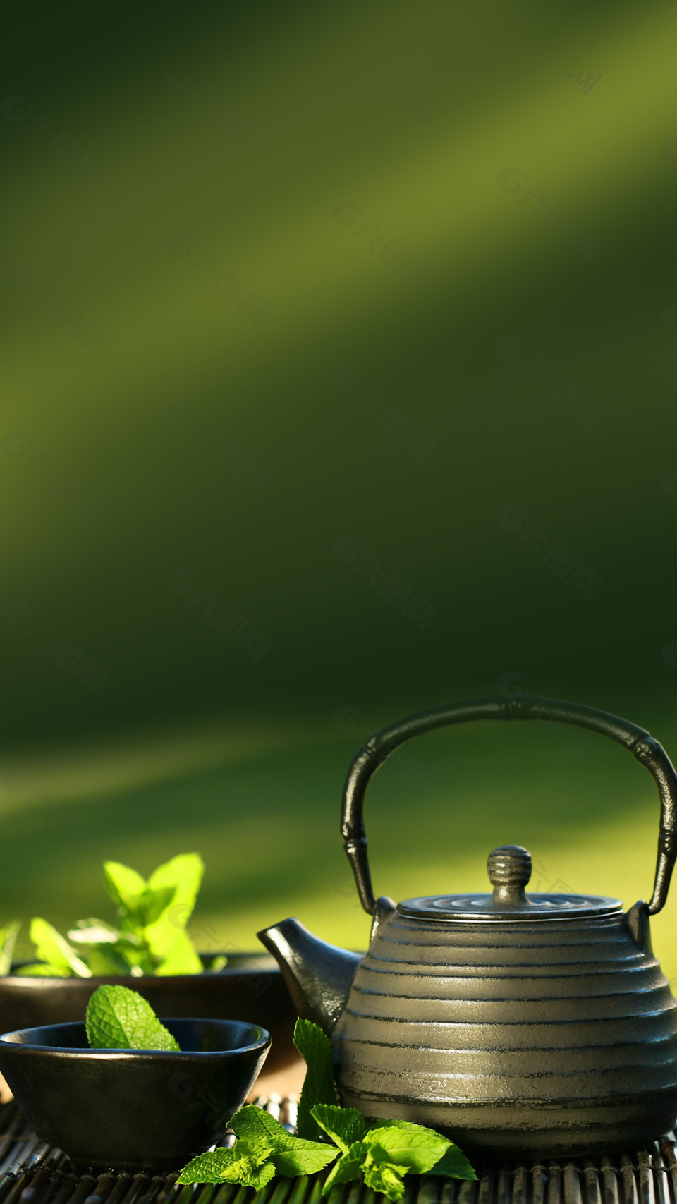 绿色茶壶茶园背景
